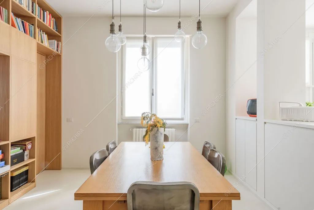 Sala da pranzo dell'appartamento Papagayo, location in stile contemporaneo a Milano