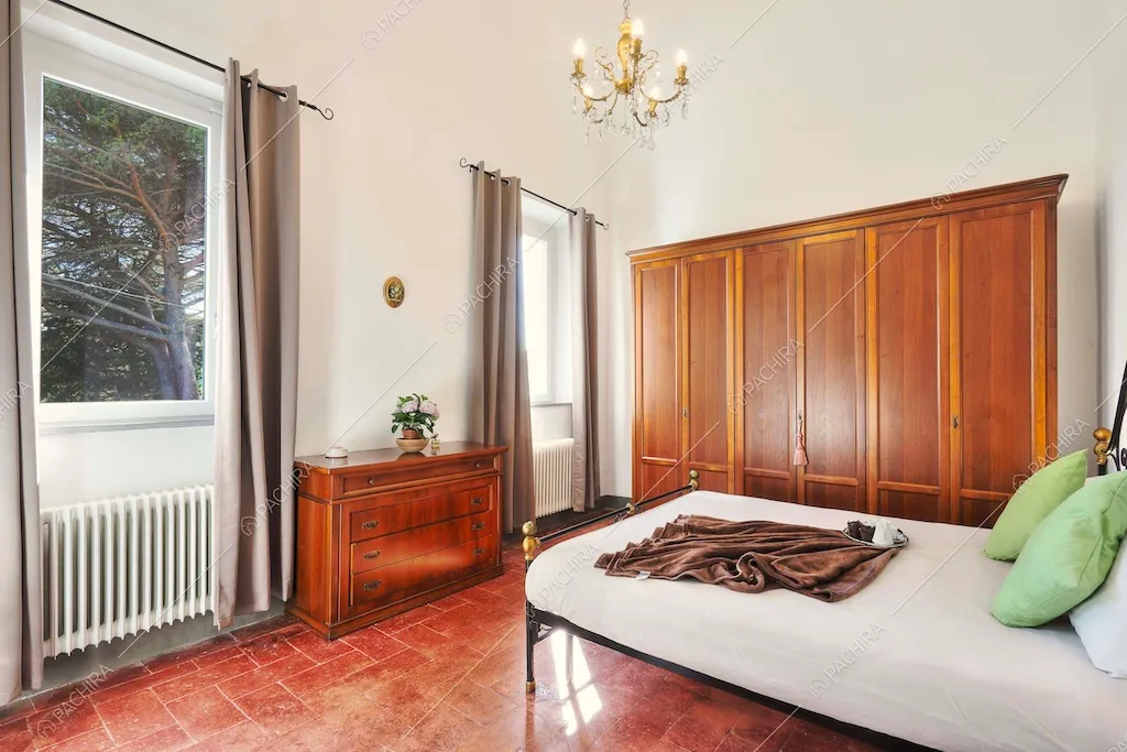 Camera da letto della dimora storica Denali, location in stile classico a Pisa