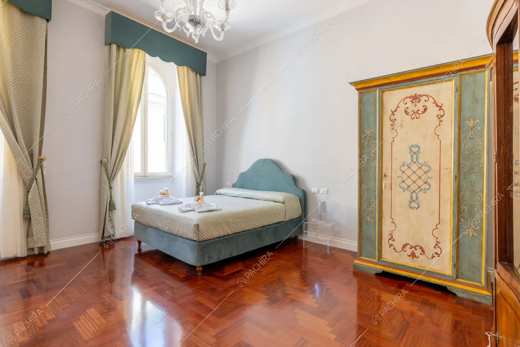 Camera da letto dell'appartamento Ural, location in stile moderno a Roma