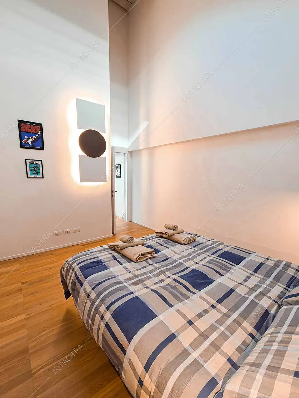 Camera da letto della location Drina, loft in stile moderno a Milano