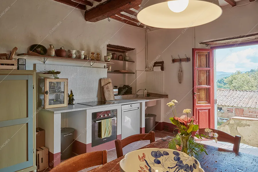 Cucina a parete della masseria Mincio, location in stile rustico a Lucca