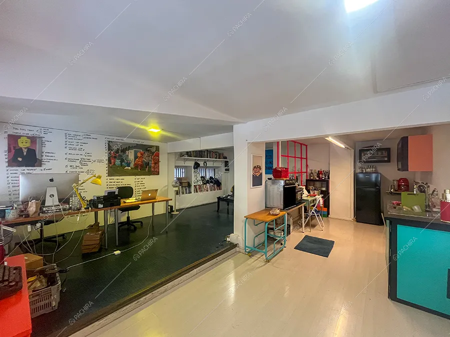 Studio e cucina dello spazio espositivo Paranà, location in stile minimal a Roma