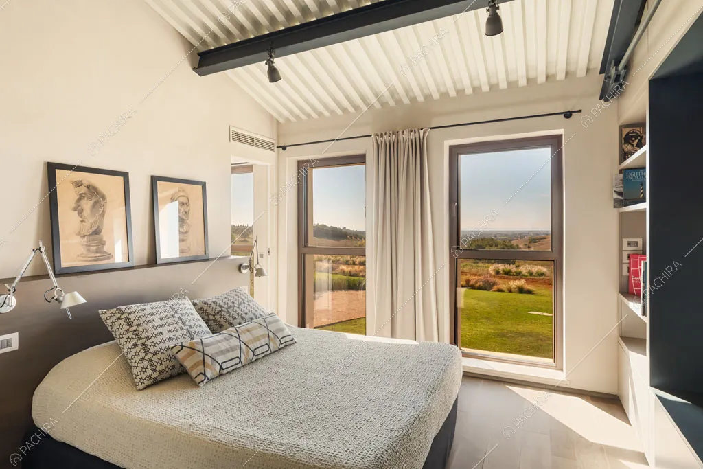 Camera da letto della villa Gypsum, location in stile moderno a Grosseto