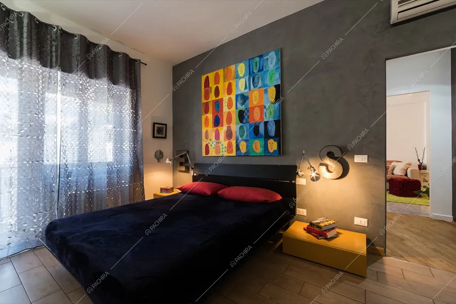 Camera da letto dell'appartamento Araguaia, location in stile moderno a Roma