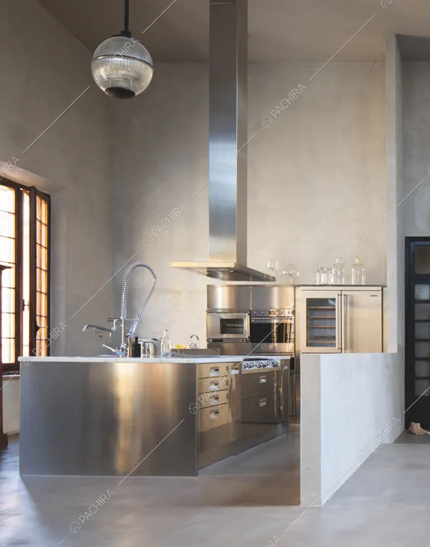 Cucina a isola del loft Reno, location in stile contemporaneo a Reggio Emilia