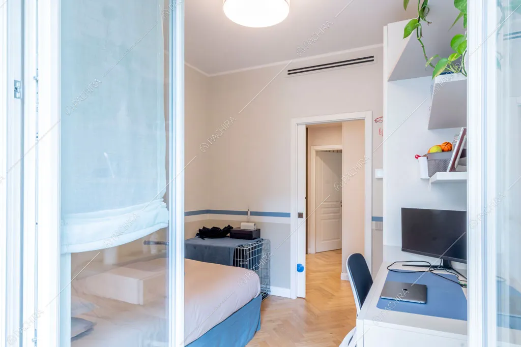 Camera da letto dell'appartamento Capsico, location in stile contemporaneo a Milano