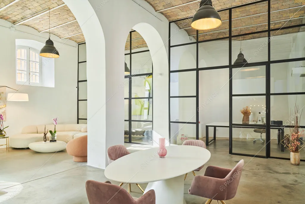 Zona living del loft Manaslu, location in stile minimal a Roma