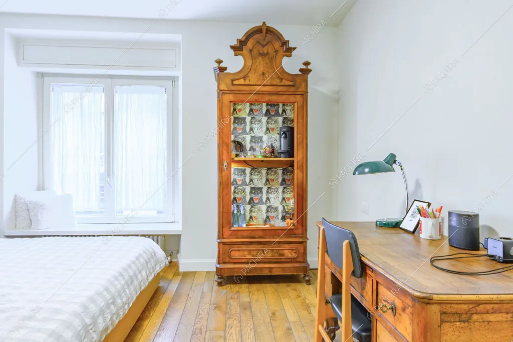 Camera da letto matrimoniale dell'appartamento Tramontana, location in stile contemporaneo a Milano