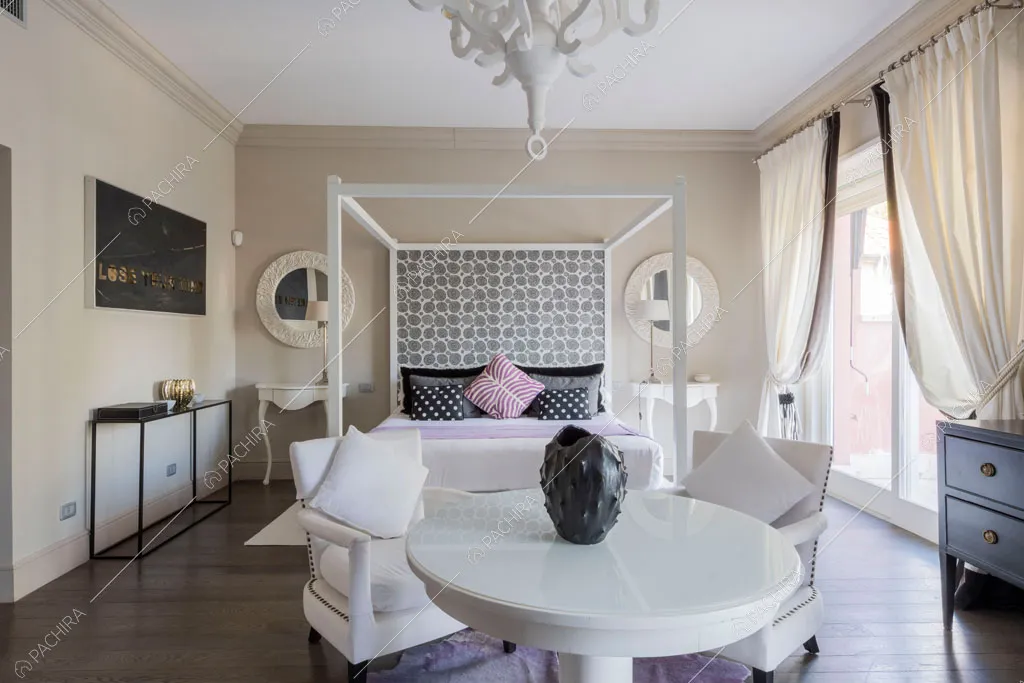 Camera da letto della villa Espero, location in stile contemporaneo a Roma